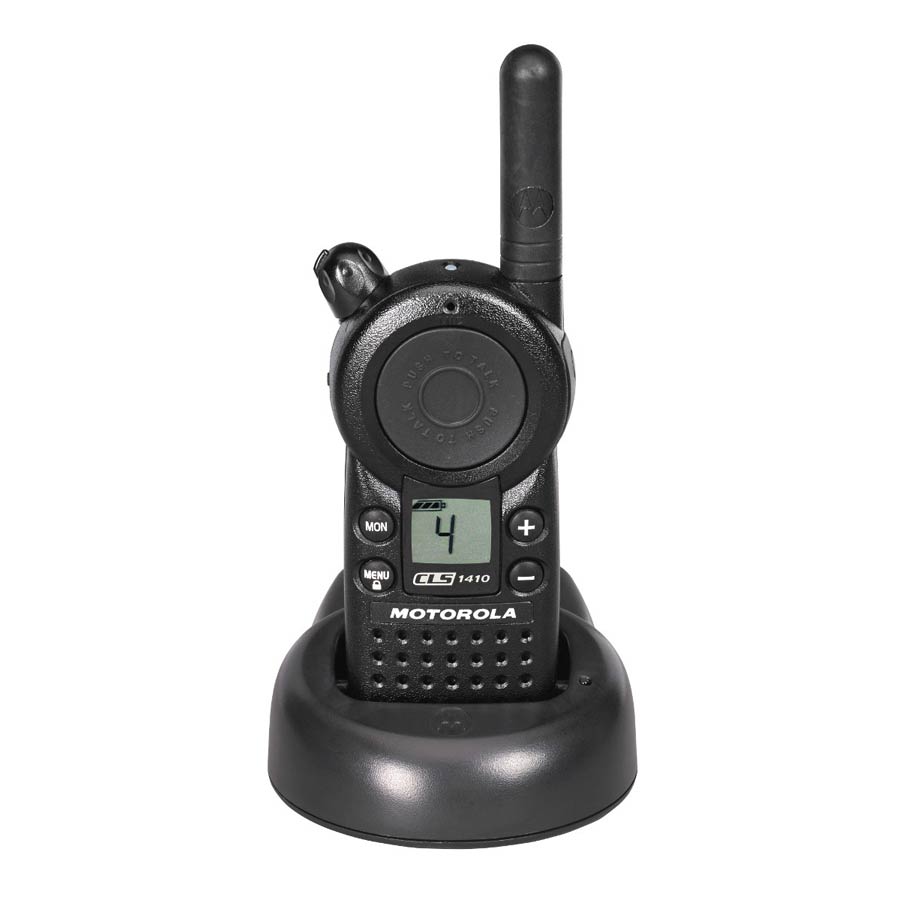 Motorola CLS-1410 two-way radio on charging stand, ensuring it’s always ready